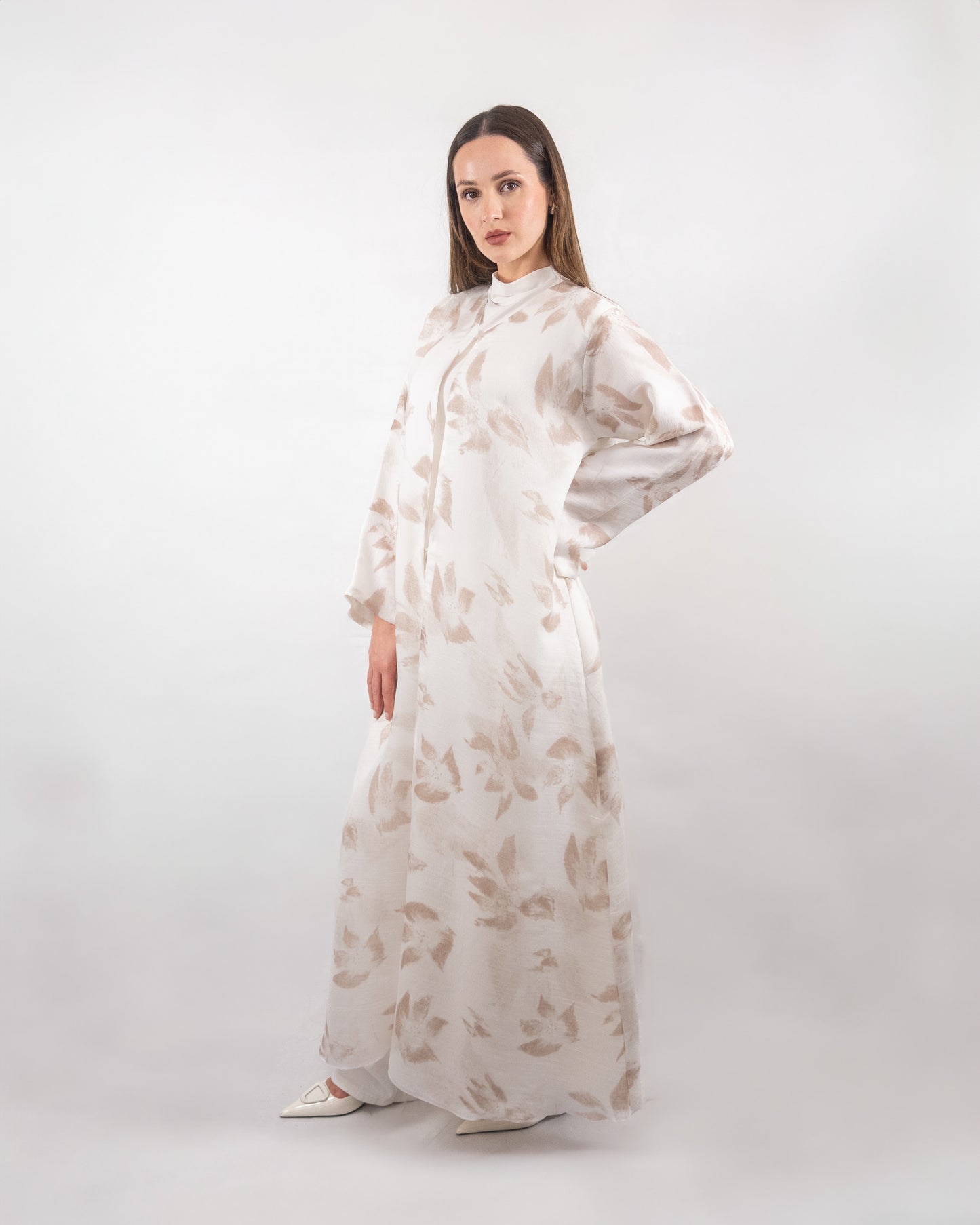Elegant Printed White Abaya with Subtle Floral Pattern