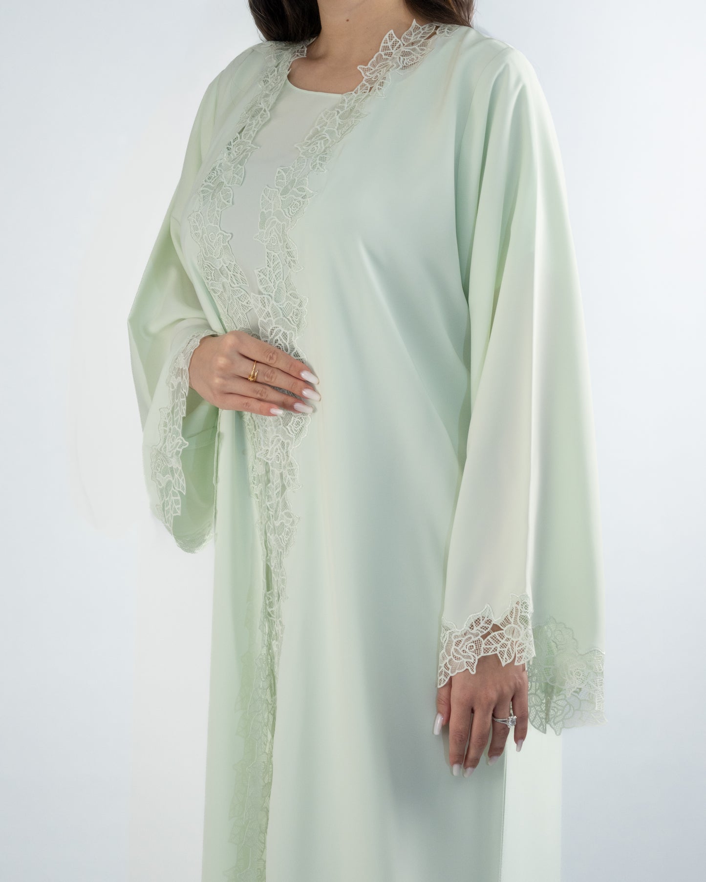 Elegant Pastel Green Lace-Trimmed Abaya